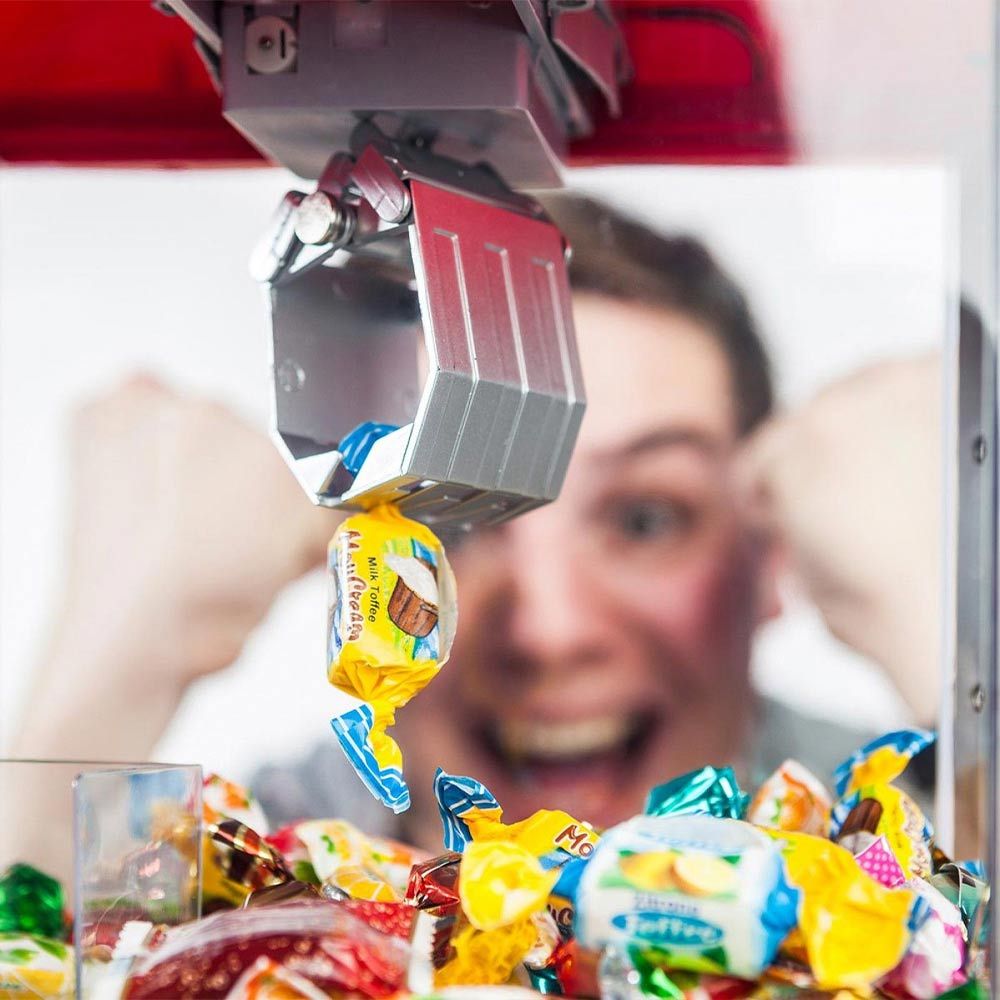 Grab Candy ili automat za igračke za grabljenje slatkiša ili bombona