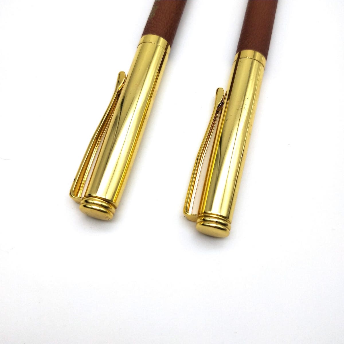 luksuzna zlatna kemijska olovka s kožom